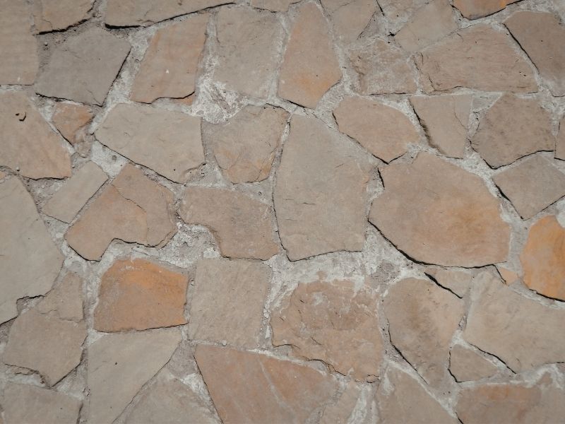 Natural stone paver surface used for patios and walkways with irregular shapes