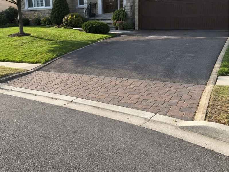 Brick pavers for a driveway apron where pavement meets the street in Madison Alabama
